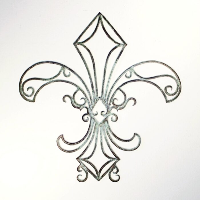 Modern, contemporary art: a wall-hanging metal sculpture in cast bronze filigree with blue-green patina, the design features the polished geometric symmetrical lines and organic swirls of an abstract Fleur-di-Lis on a white background.